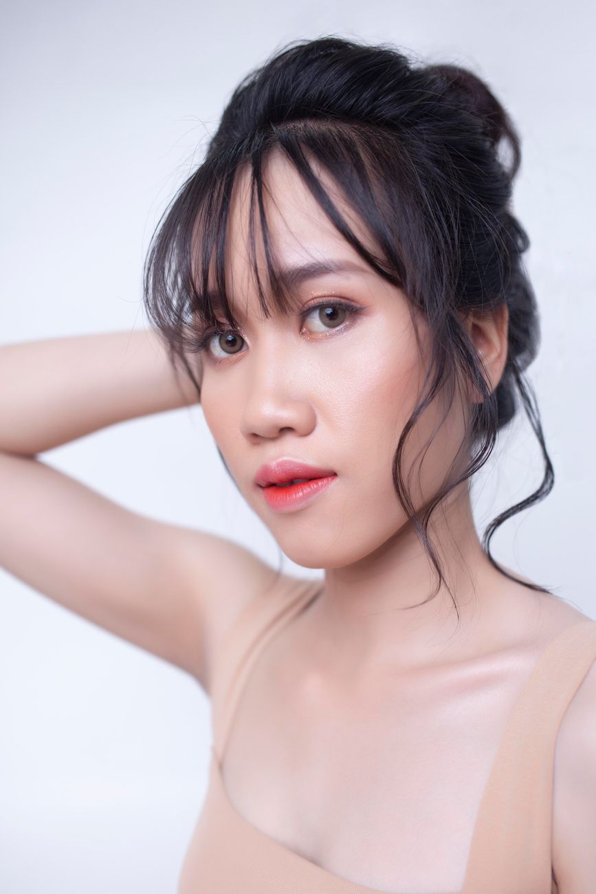 A woman with clear, healthy skin — doctor-led aesthetic care at Aera Medical Aesthetics Singapore