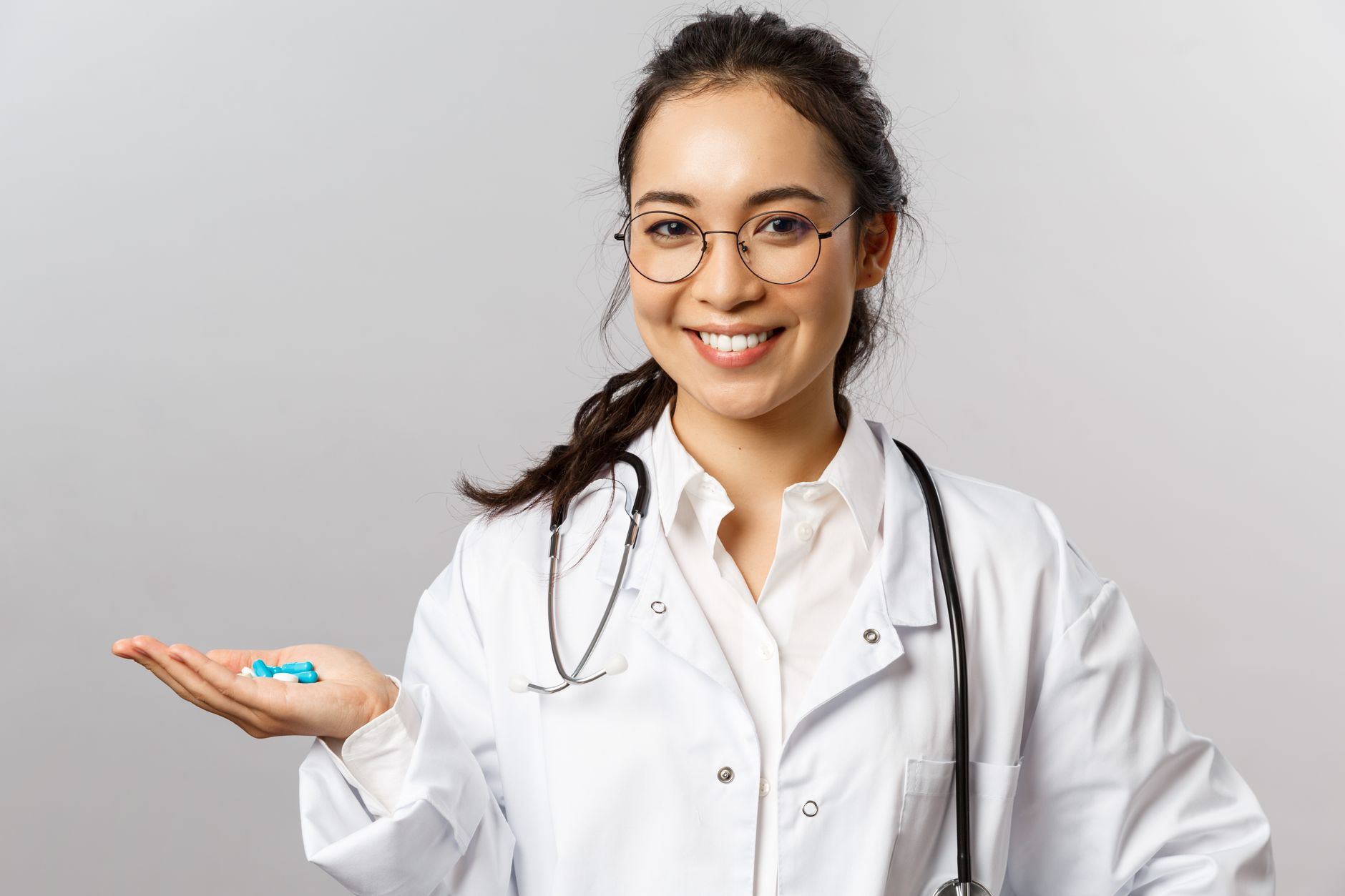 A friendly family doctor consulting a patient at Beacon Family Clinic