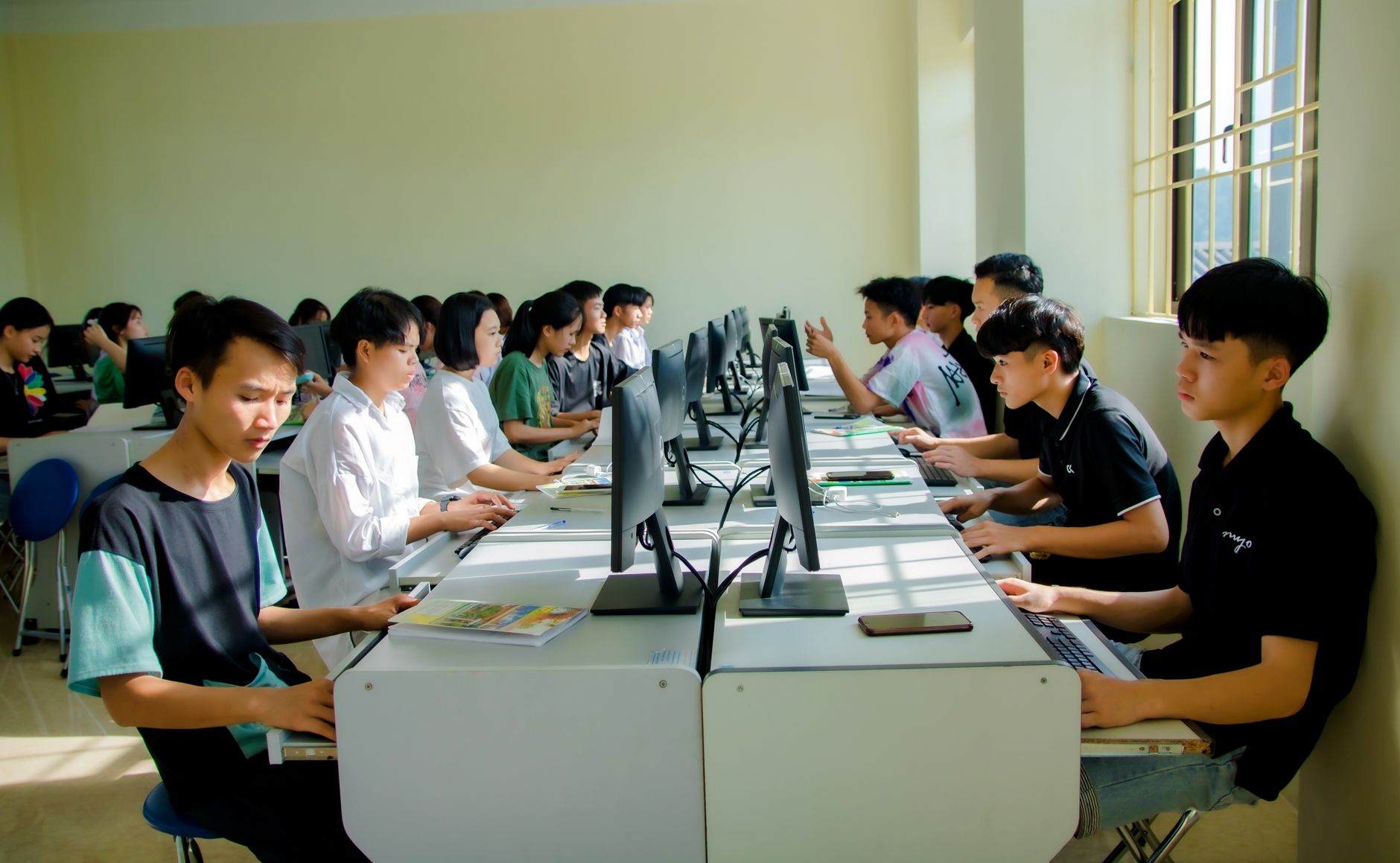 A Bytecraft Academy cohort learning to code together in Singapore