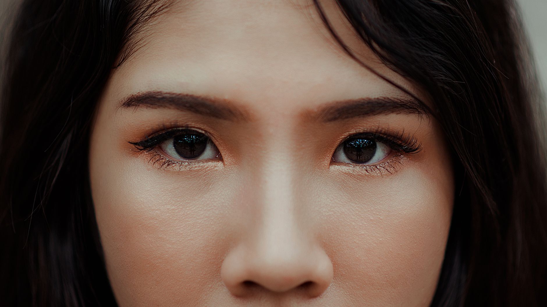 A patient with healthy, clear skin after specialist dermatology care at Clearbrook Singapore