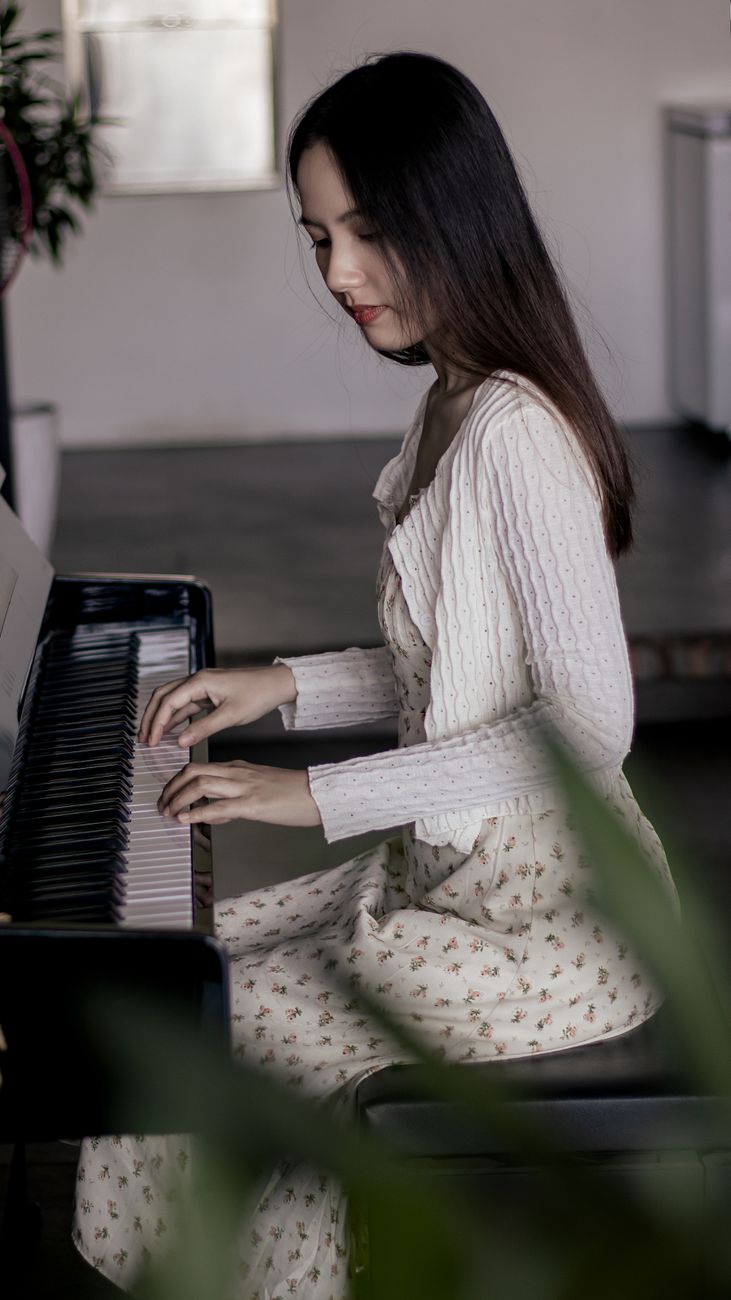 Rachel Lim, founder of Forte Piano Studio, at the piano