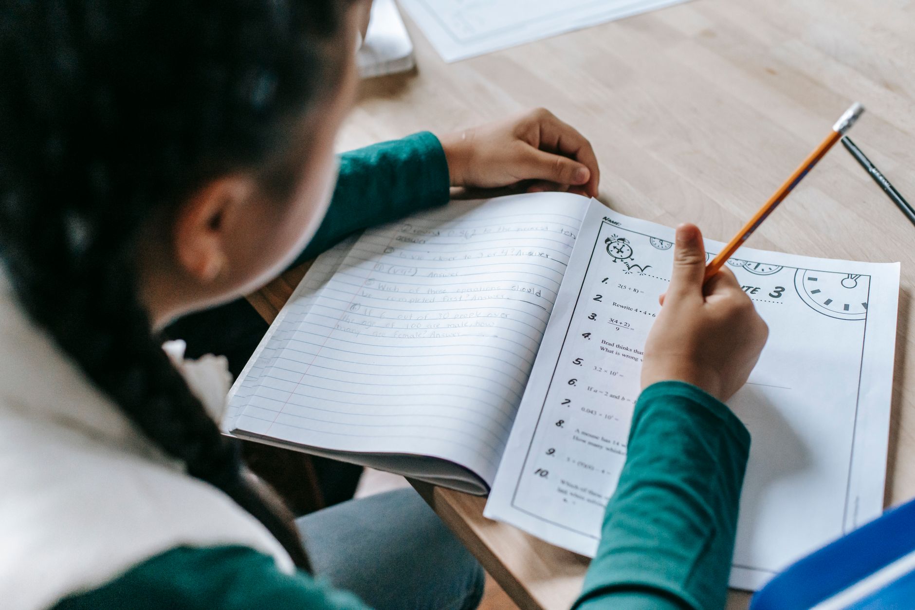 A child planning a composition with the Inklings Story-Spine method