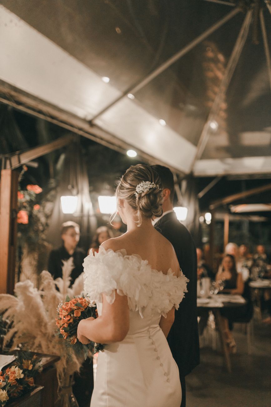 A bride in an ivory gown by Ivory & Lace, photographed in soft Singapore light