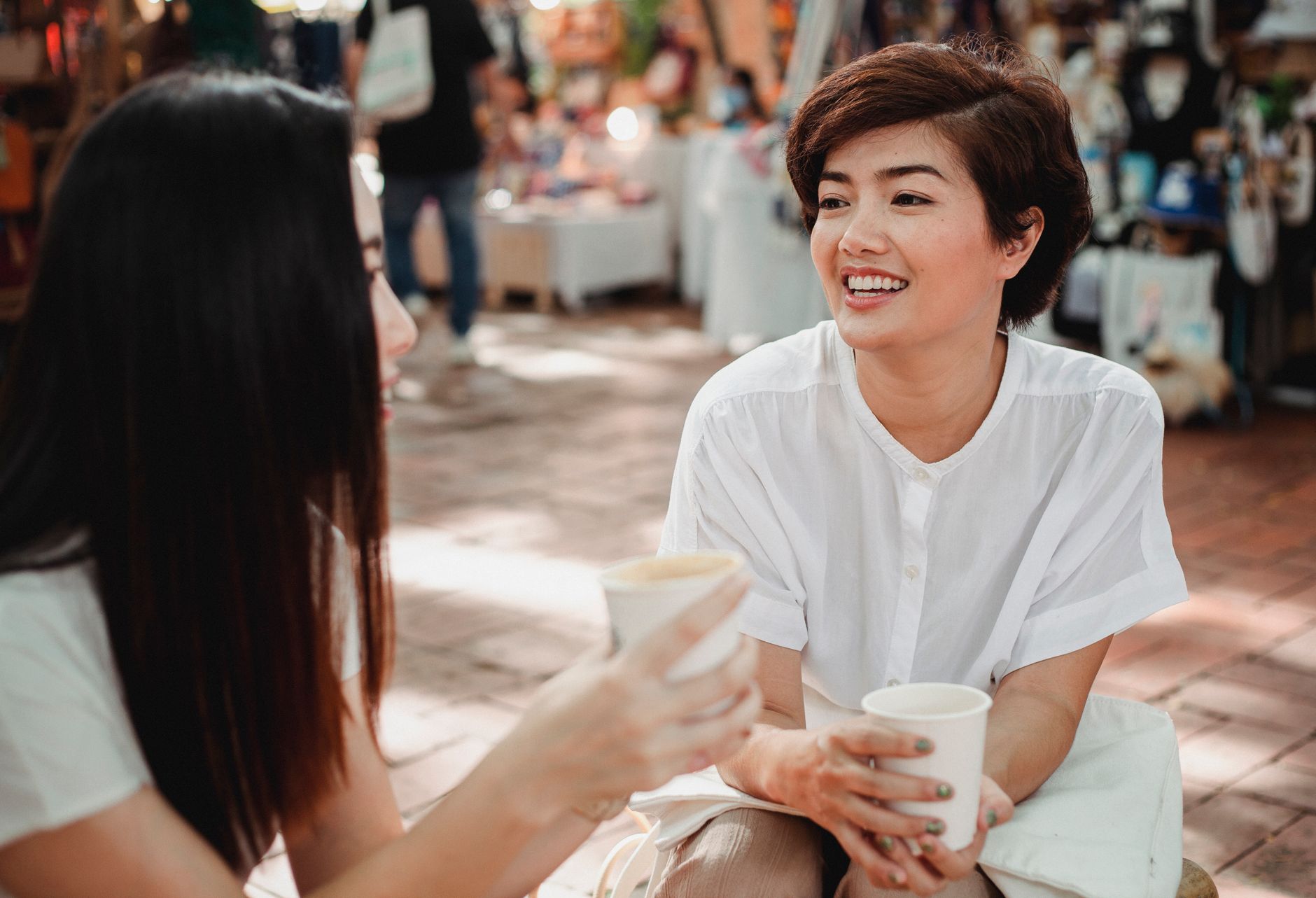 Members of Kindred talking over coffee