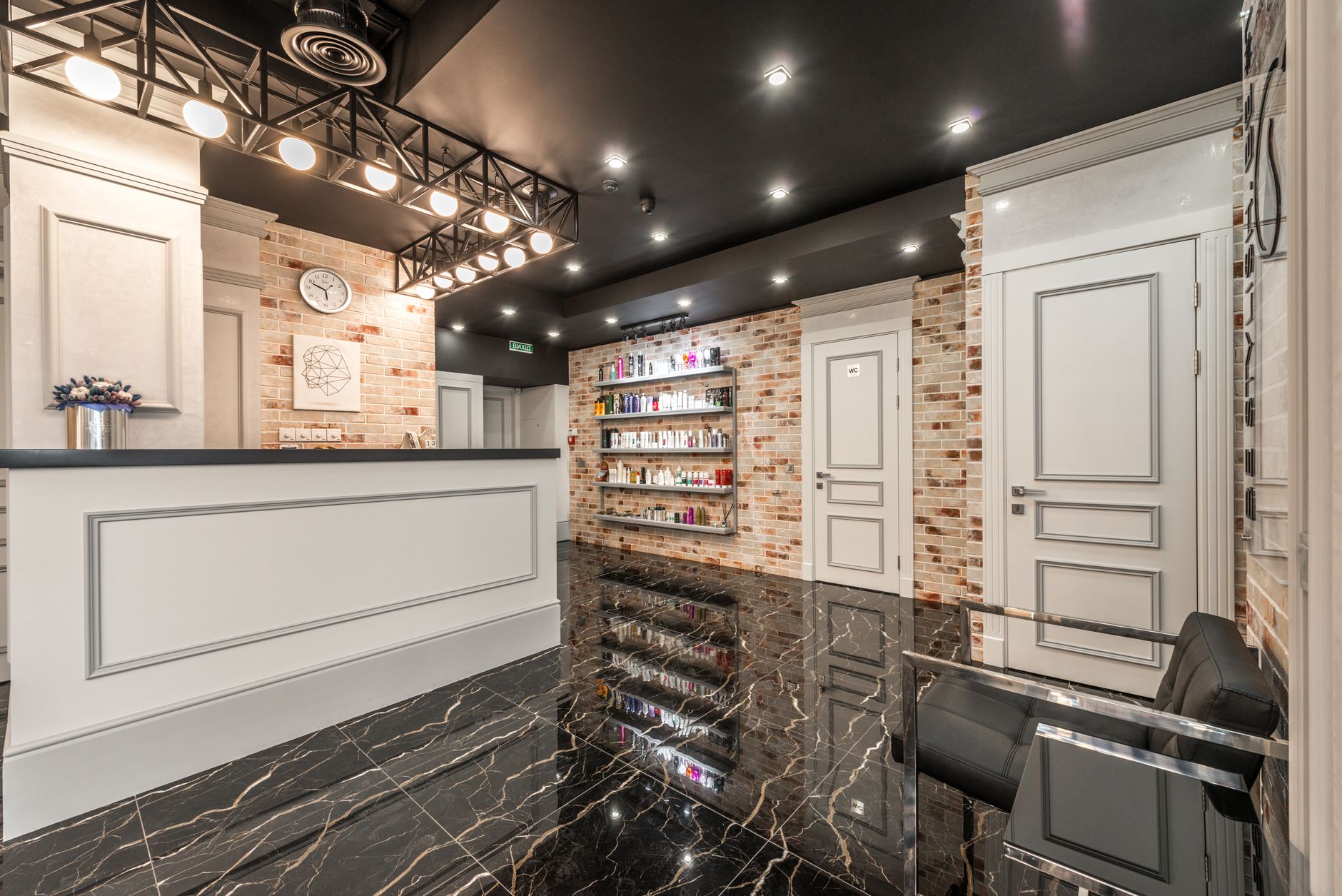 The calm cream-and-gold reception of the Lumea facial spa
