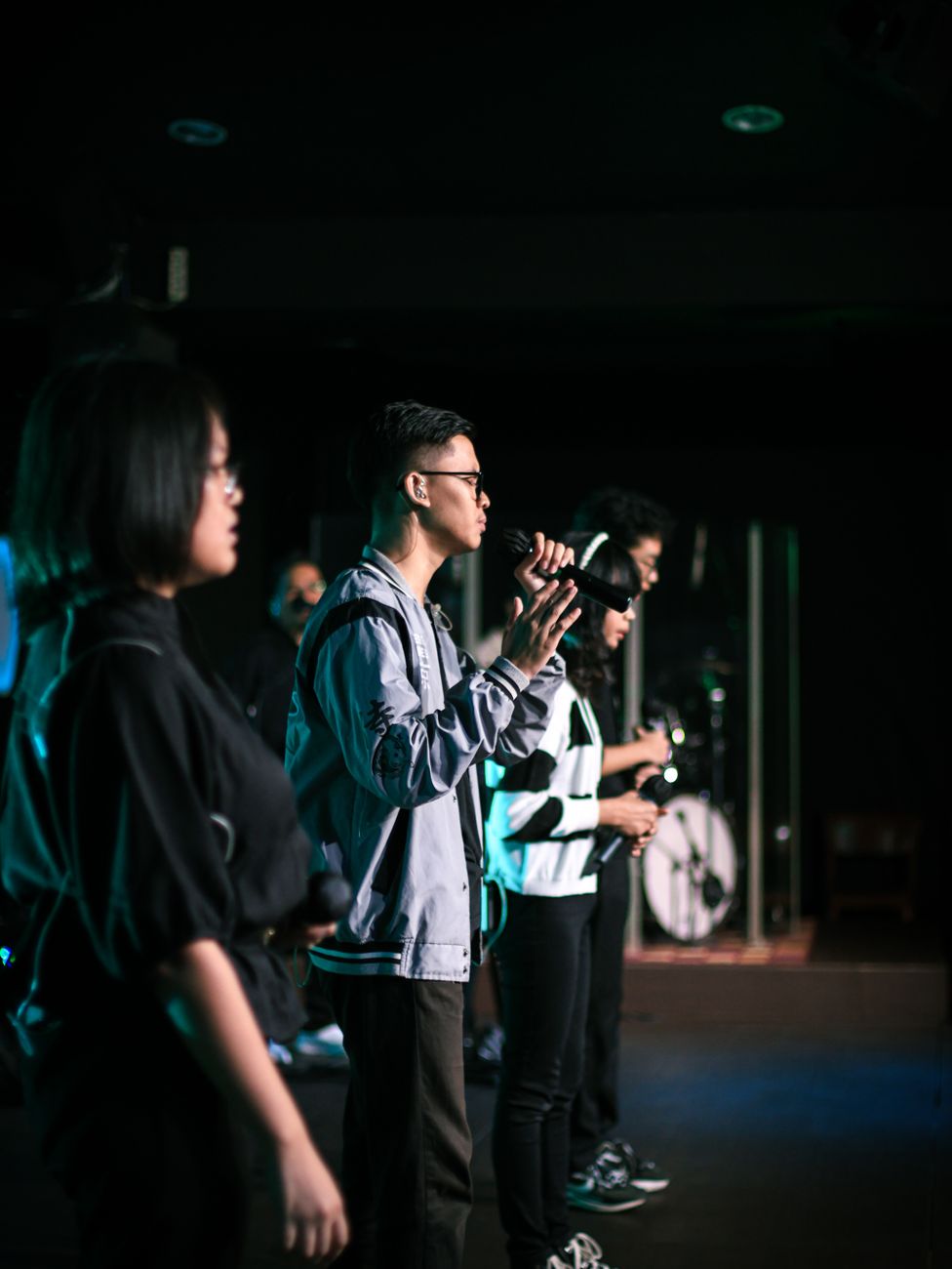 A male singer performing live
