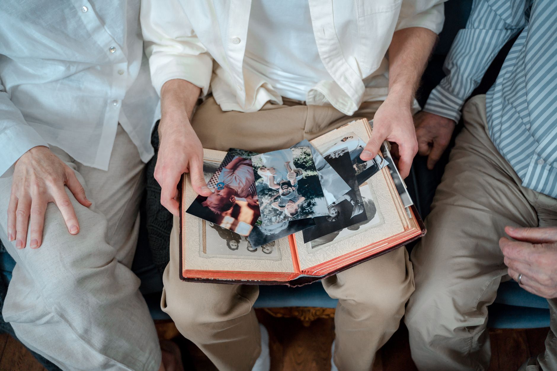 A family looking through a photo album together