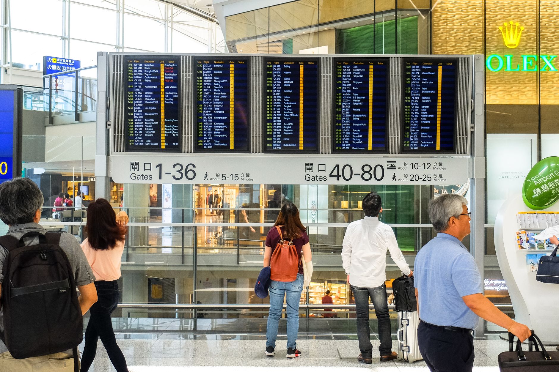 Singapore traveller at the airport, covered by a Roamsure travel-insurance plan