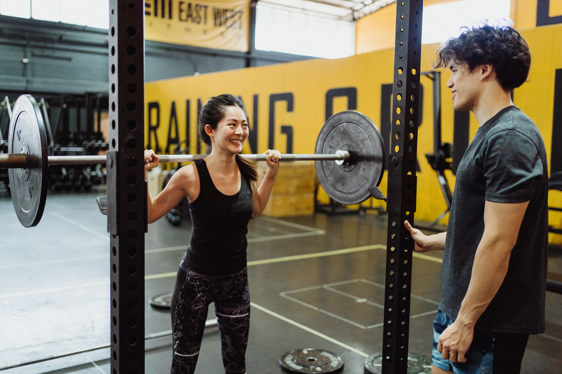 Sasha Lim coaching a client outdoors