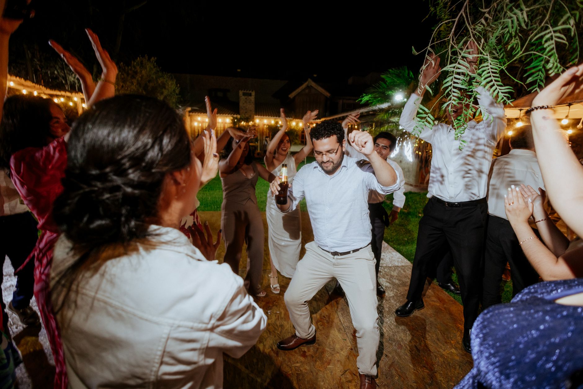 Wedding guests dancing and celebrating
