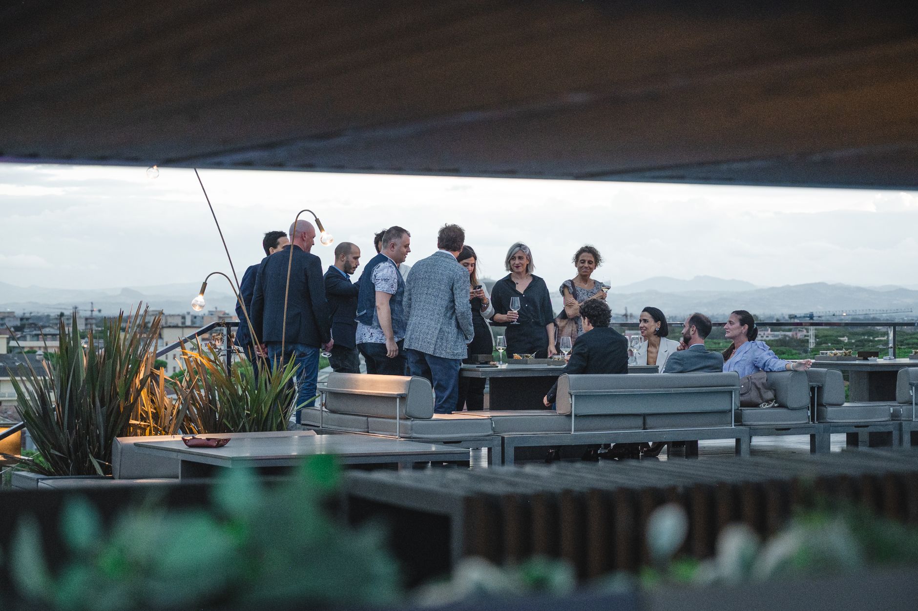 Residents at a Stack Living rooftop social