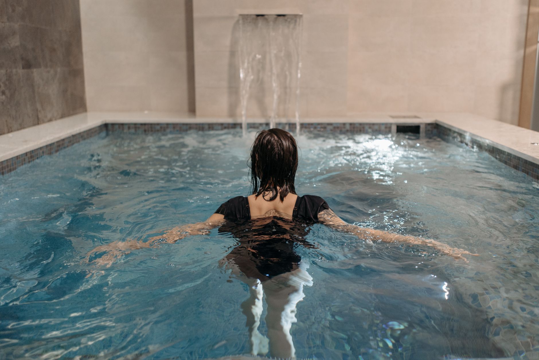 The warm mineral soak and relaxation deck at Stillwater Day Spa Singapore