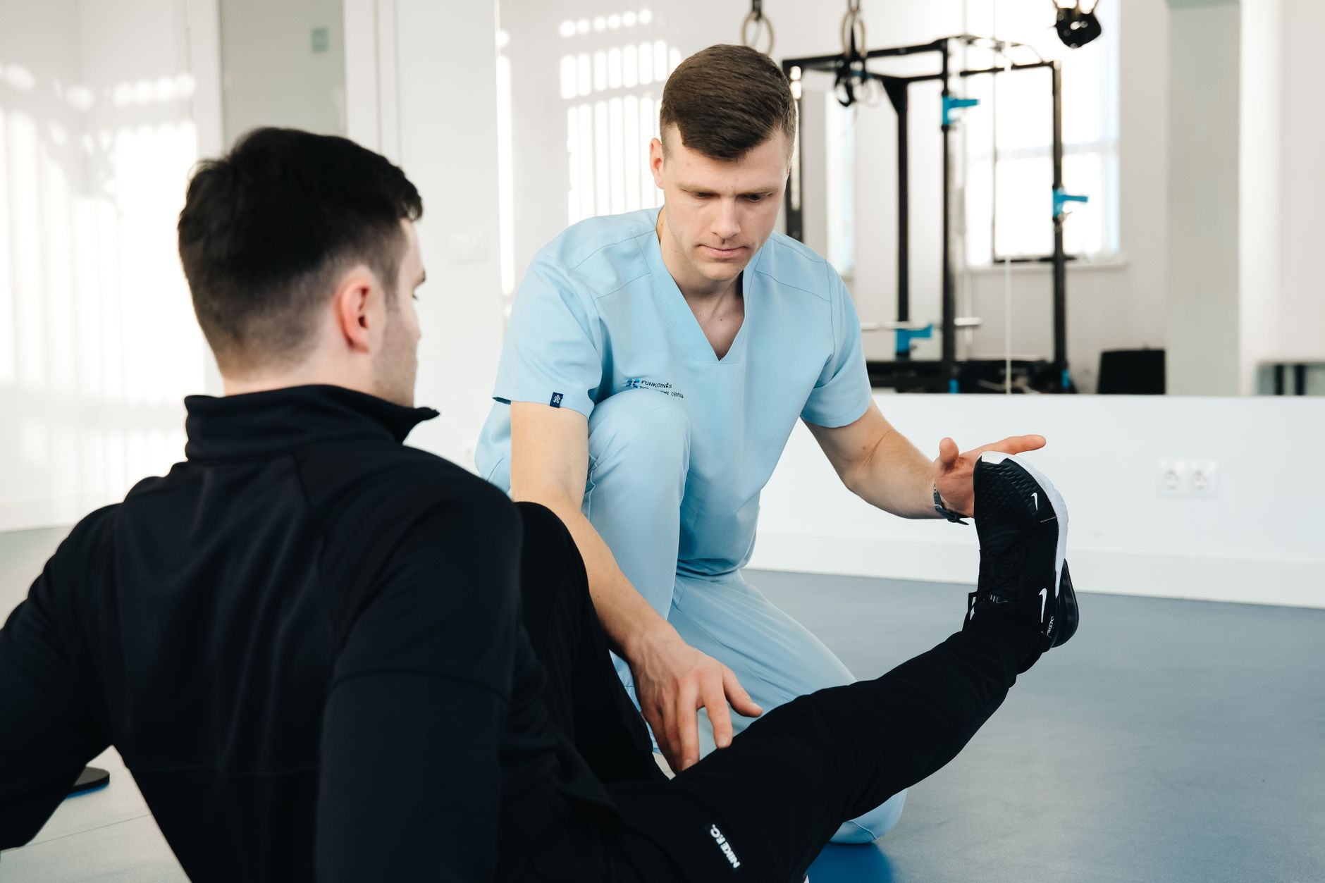 A Stride physiotherapist with a patient
