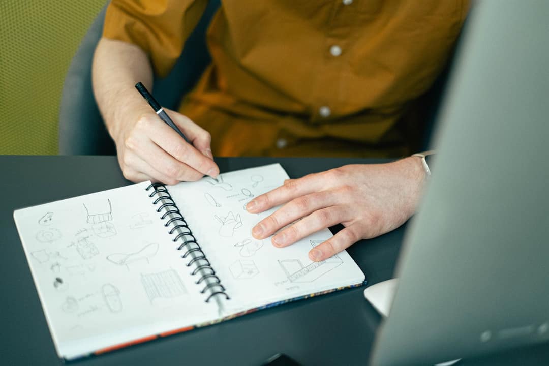 Local artist sketching a design