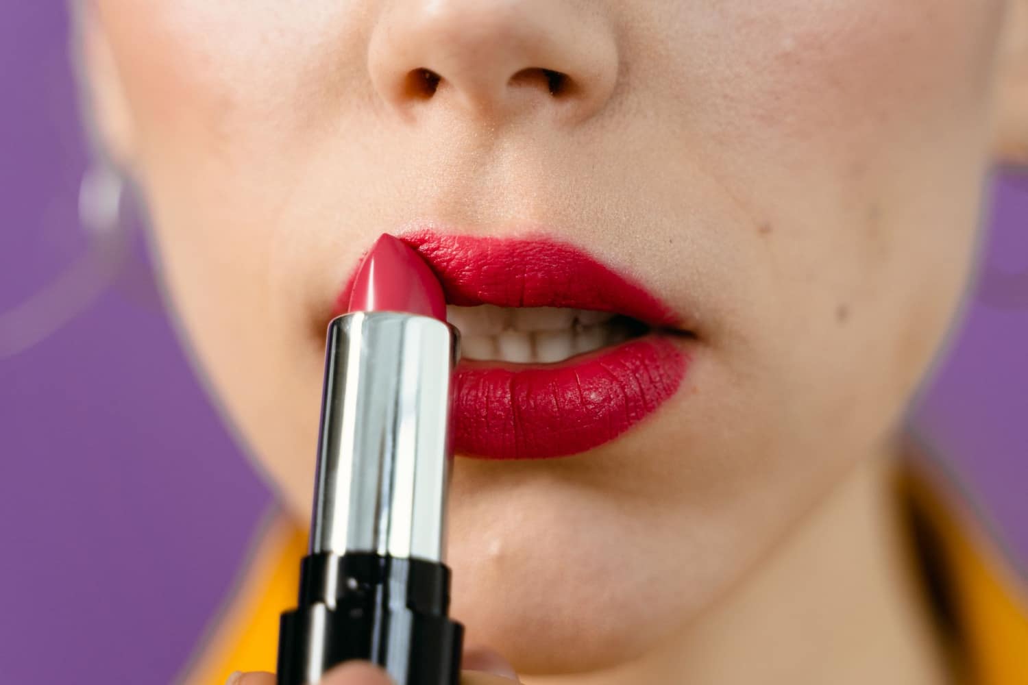 A close-up of bold lip and eye colour on Singapore skin
