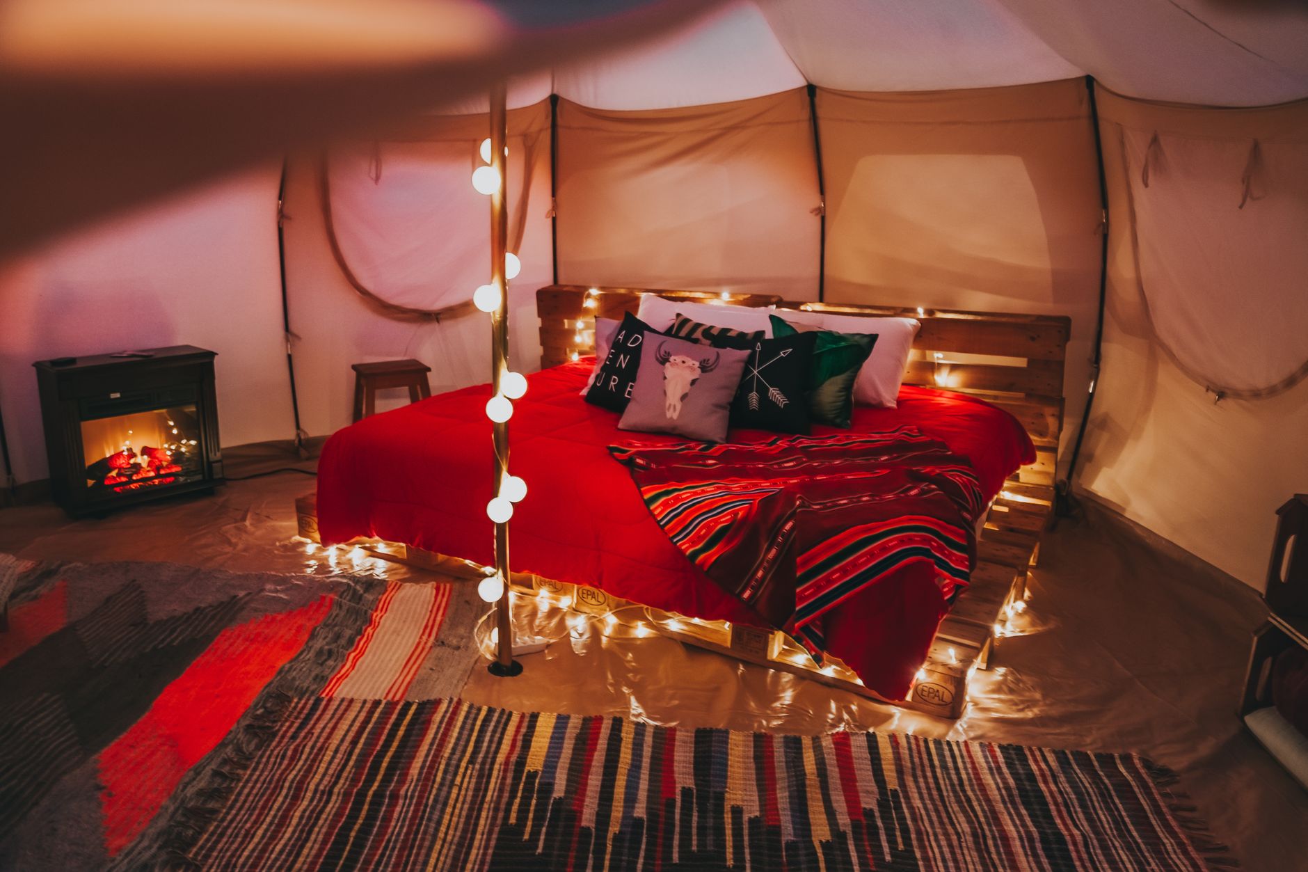 A bell tent interior at Wildnest
