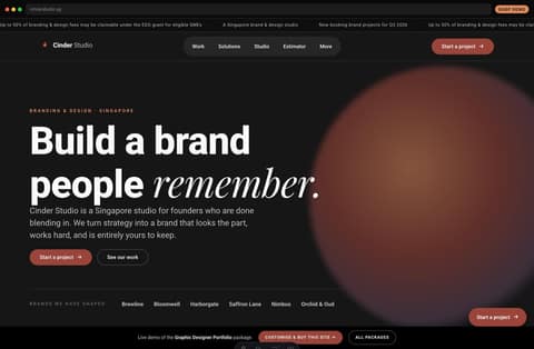 Cinder Studio graphic-design & branding studio portfolio homepage demo — dark theme with a colourful case-study mosaic (Singapore)