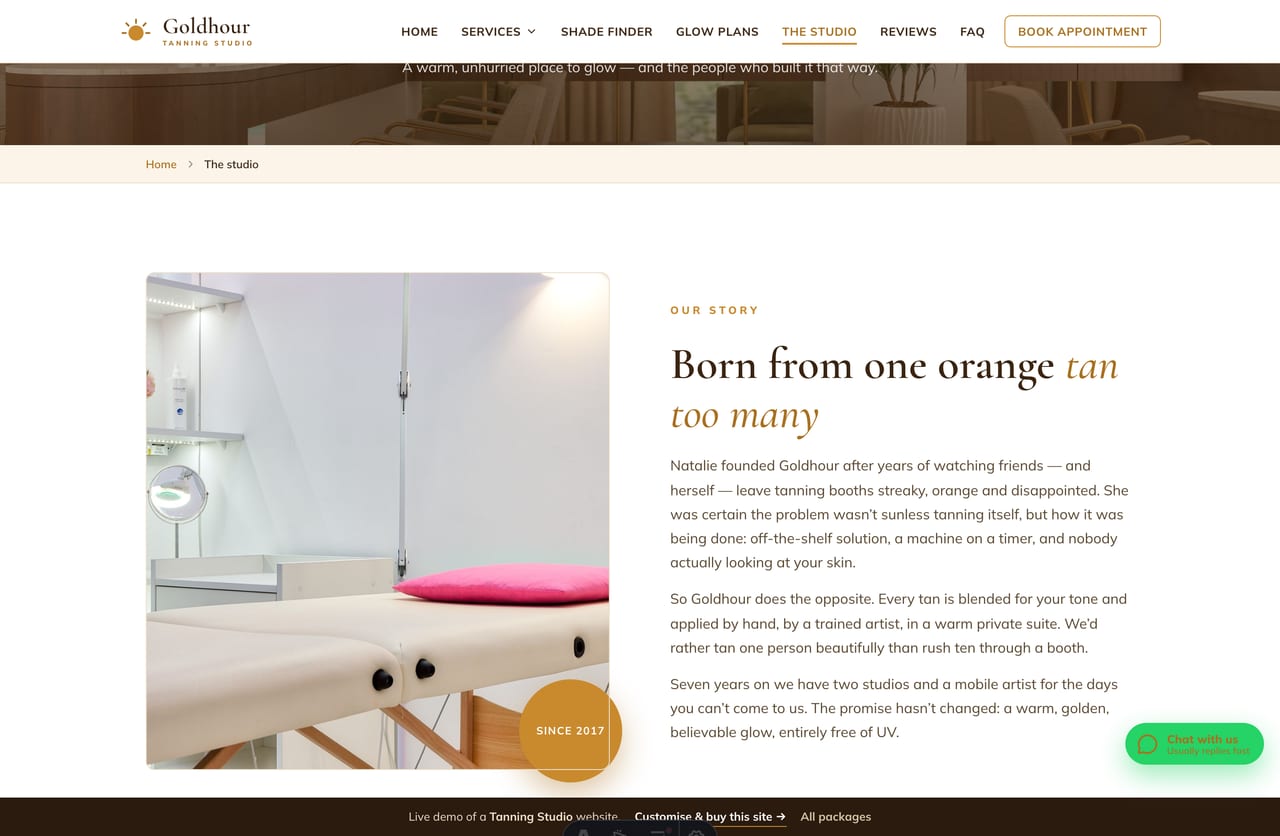 The studio page on the Goldhour demo — founder story, stats, why-us, the studio spaces and tan-artist profiles