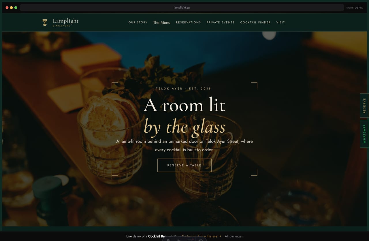 Lamplight cocktail bar Singapore website homepage demo — a deep-emerald art-deco site with a framed dark-photo hero, brass nav and signature drink cards
