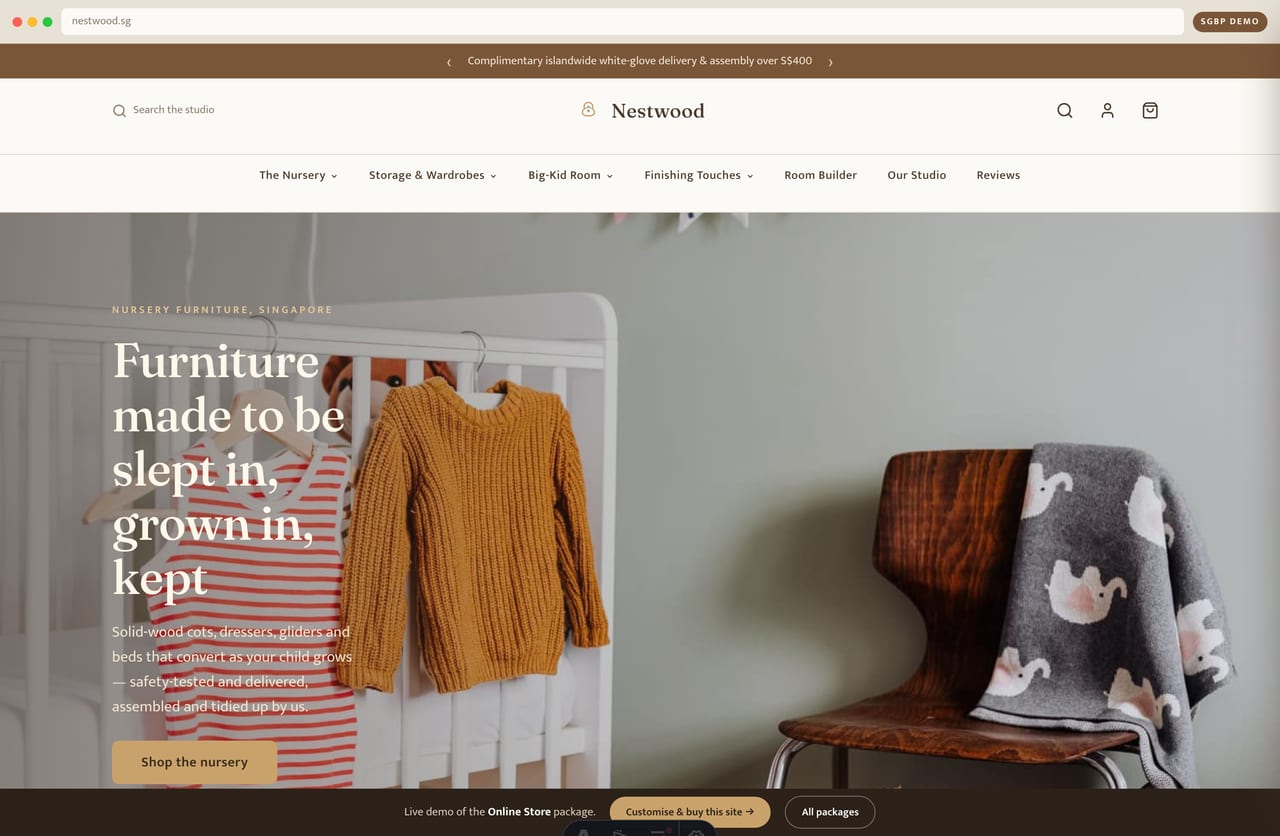 Nestwood nursery furniture online store homepage demo — full-bleed room hero, rotating announcement strip and white-glove delivery promise (Singapore)
