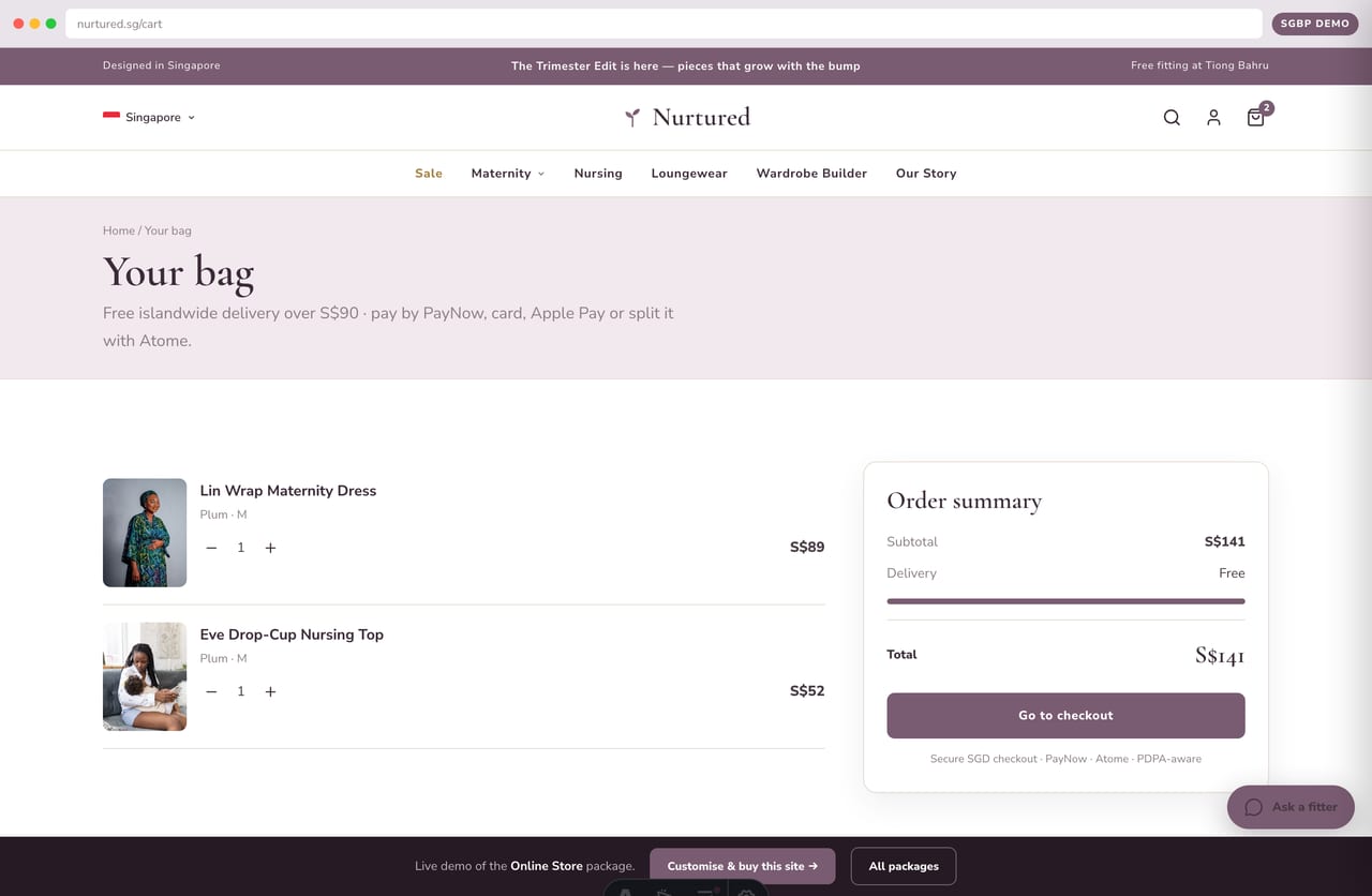 Slide-out bag with a free-islandwide-delivery progress bar on the Singapore maternity store