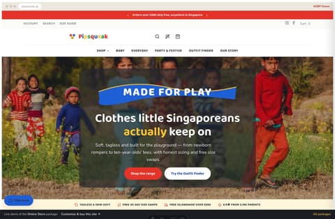 Pipsqueak children’s apparel store homepage demo — centered rainbow wordmark, a playful photo hero with a wavy ribbon and a free-islandwide-delivery promise (Singapore)