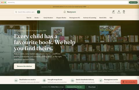 Storynest kids' bookshop online store homepage demo — warm promo strip, centered wordmark, full-bleed bookshop hero (Singapore)