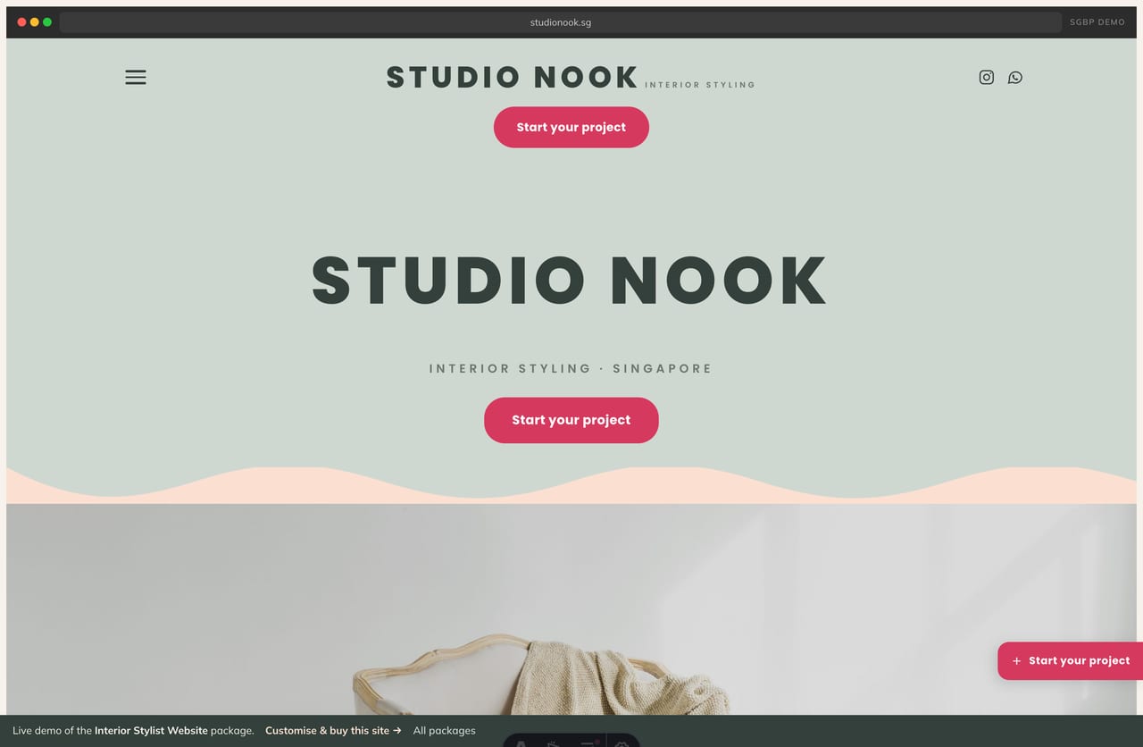 Studio Nook interior stylist website homepage demo — centered deco wordmark, scalloped wave hero and styled-room portfolio (Singapore)