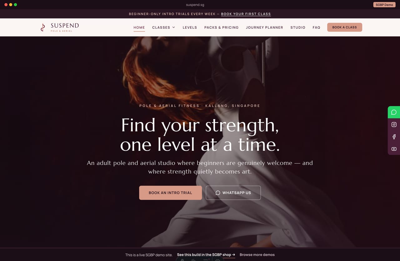 Suspend pole fitness studio Singapore website homepage demo — a moody plum and rose-gold site with a full-bleed dark hero, a centered tagline strip and class cards