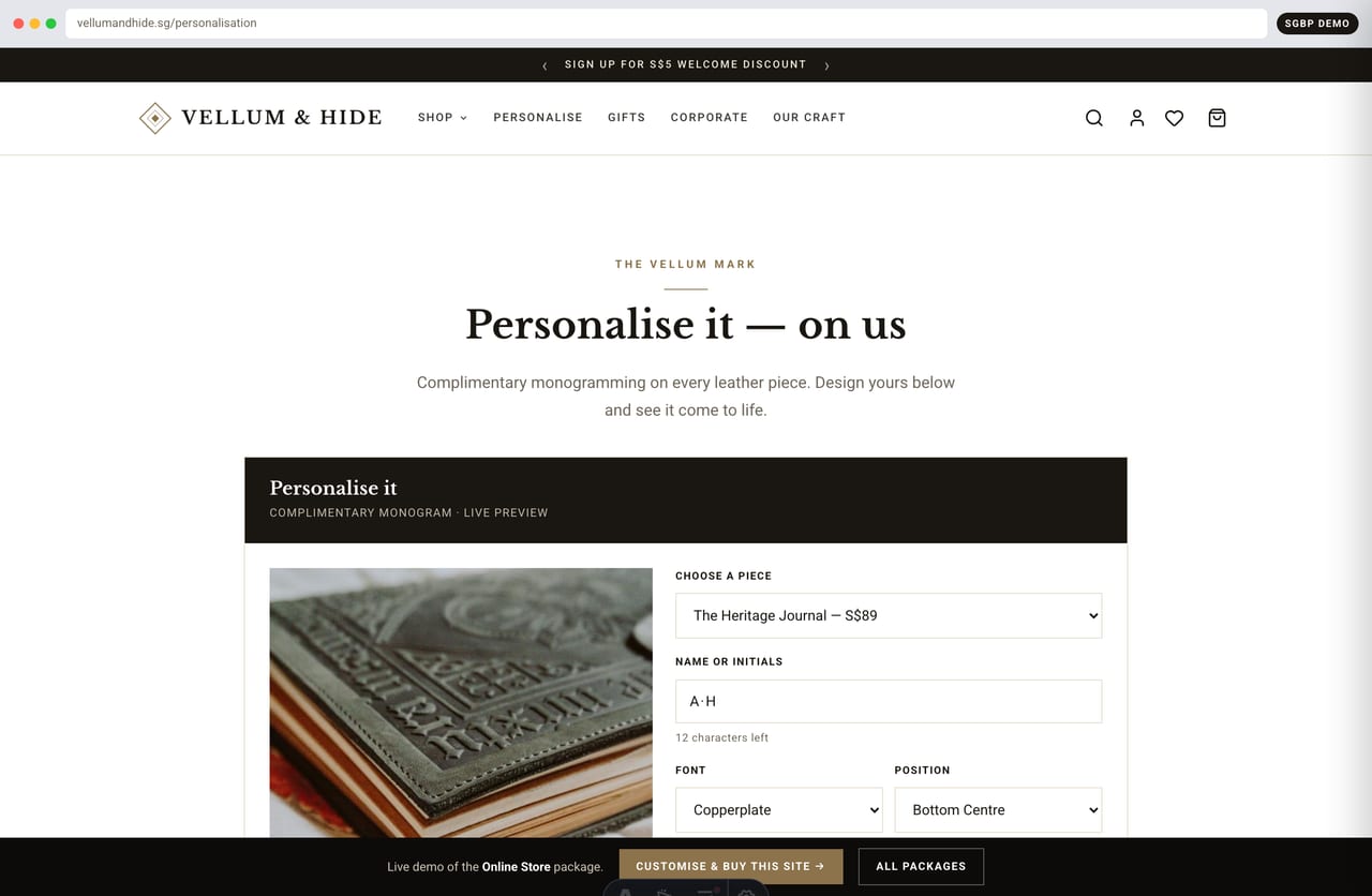 Live monogramming and personalisation studio with foil initials on a Singapore leather store